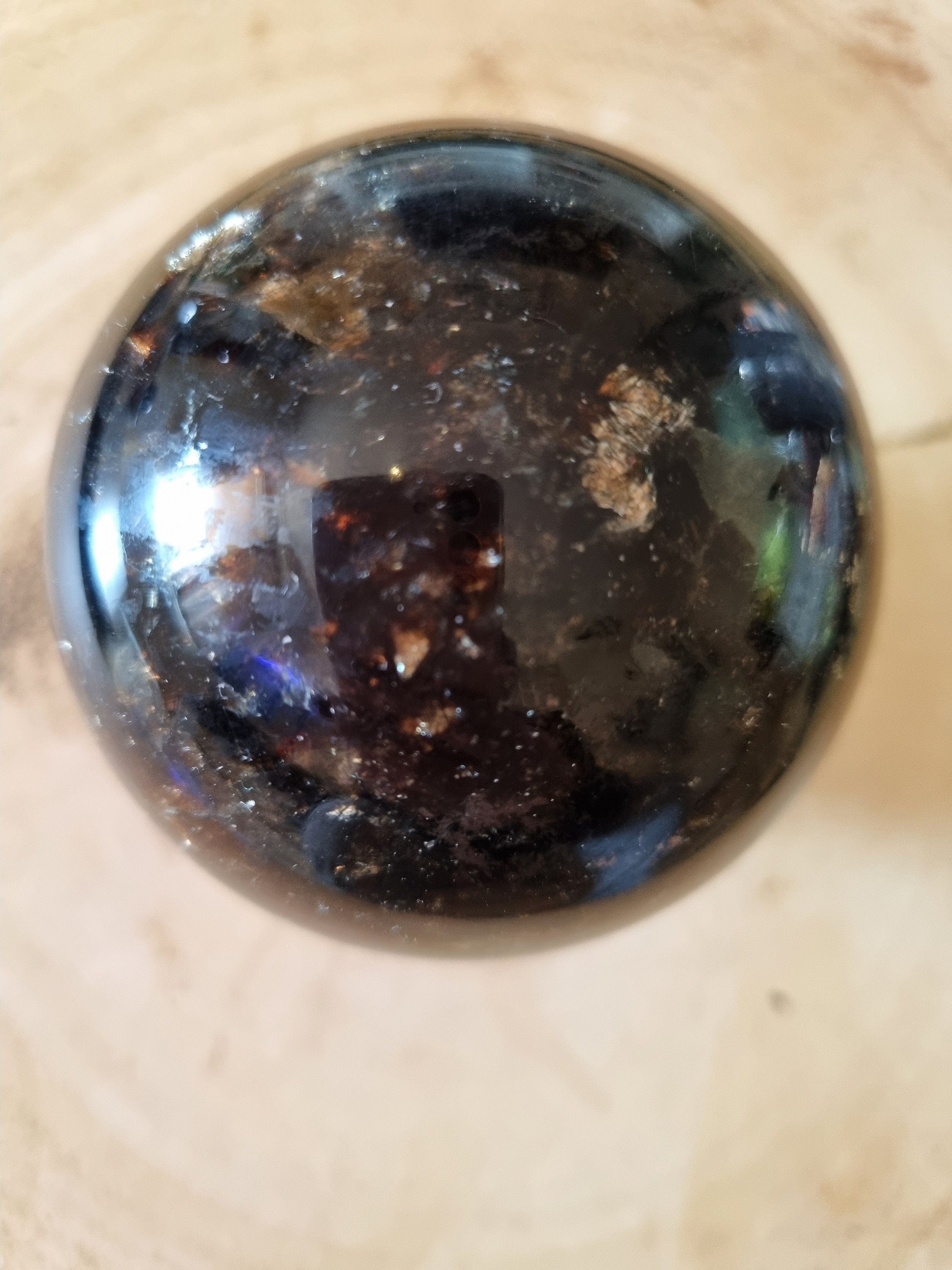 Gold and black mica sphere