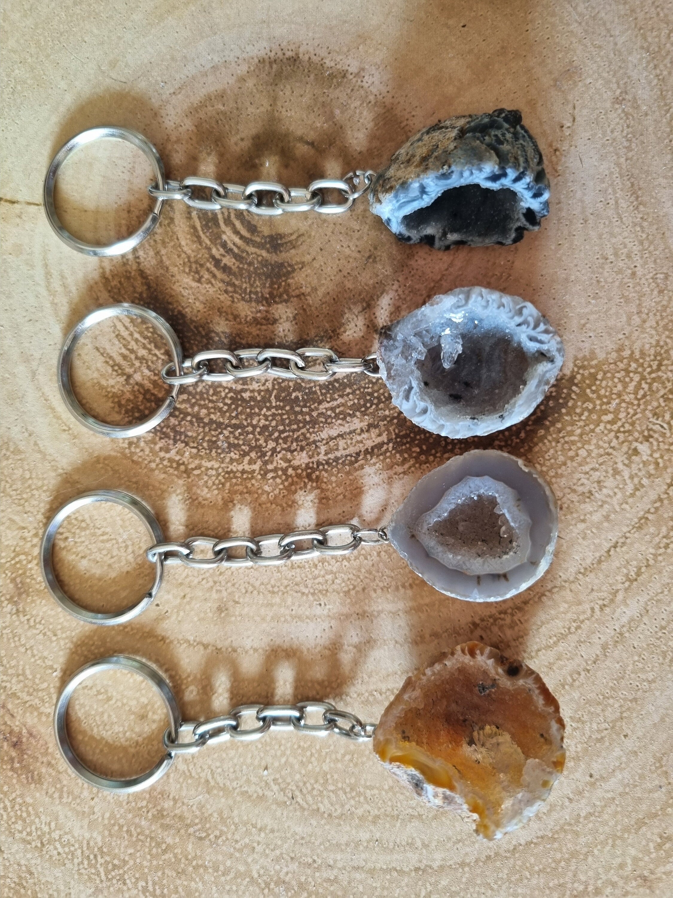 Natural Druzy Agate geode keyrings from Brazil. Each one has a silver clasps keyring.