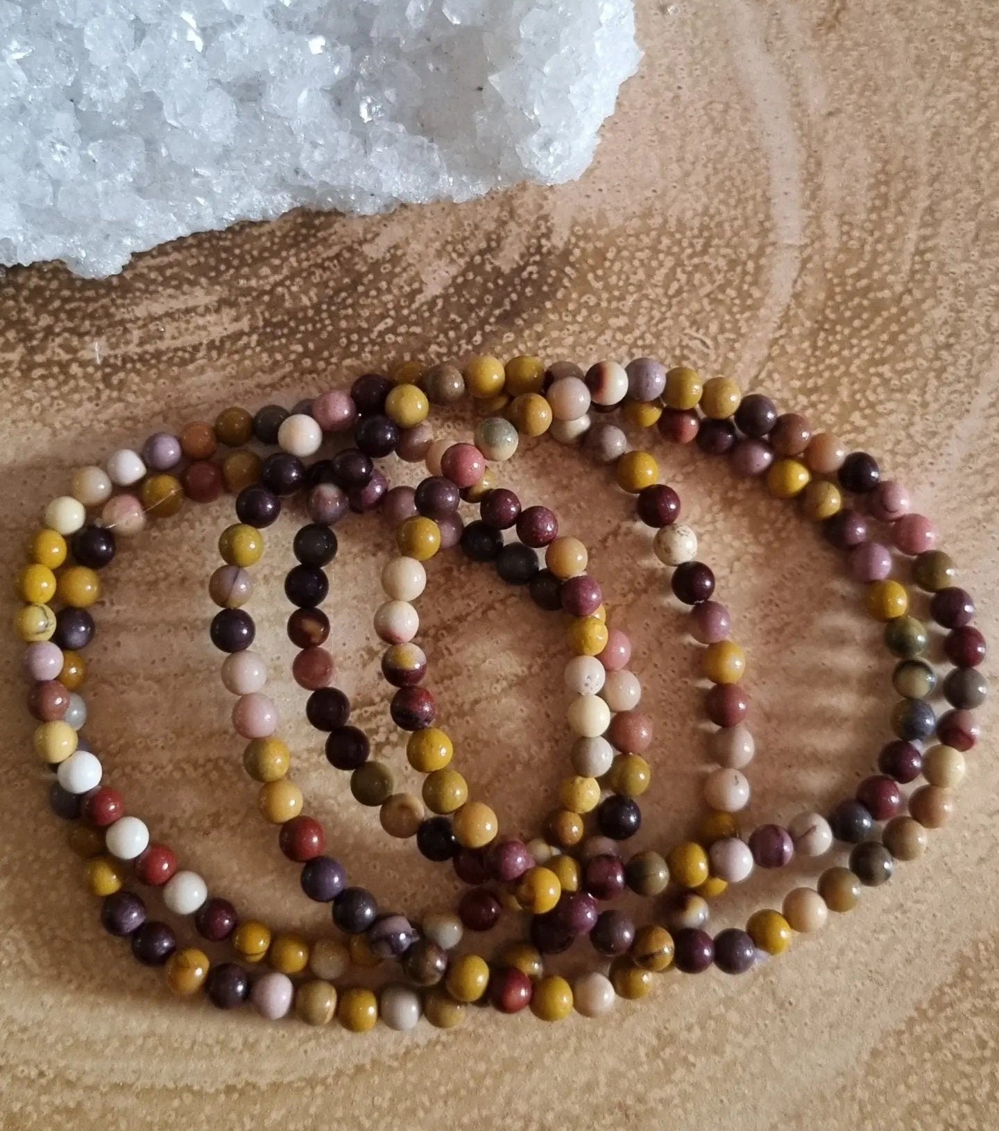 Natural Mookiate Crystal Adjustable Bracelets. In sizes 4mm and 8mm from Australia.