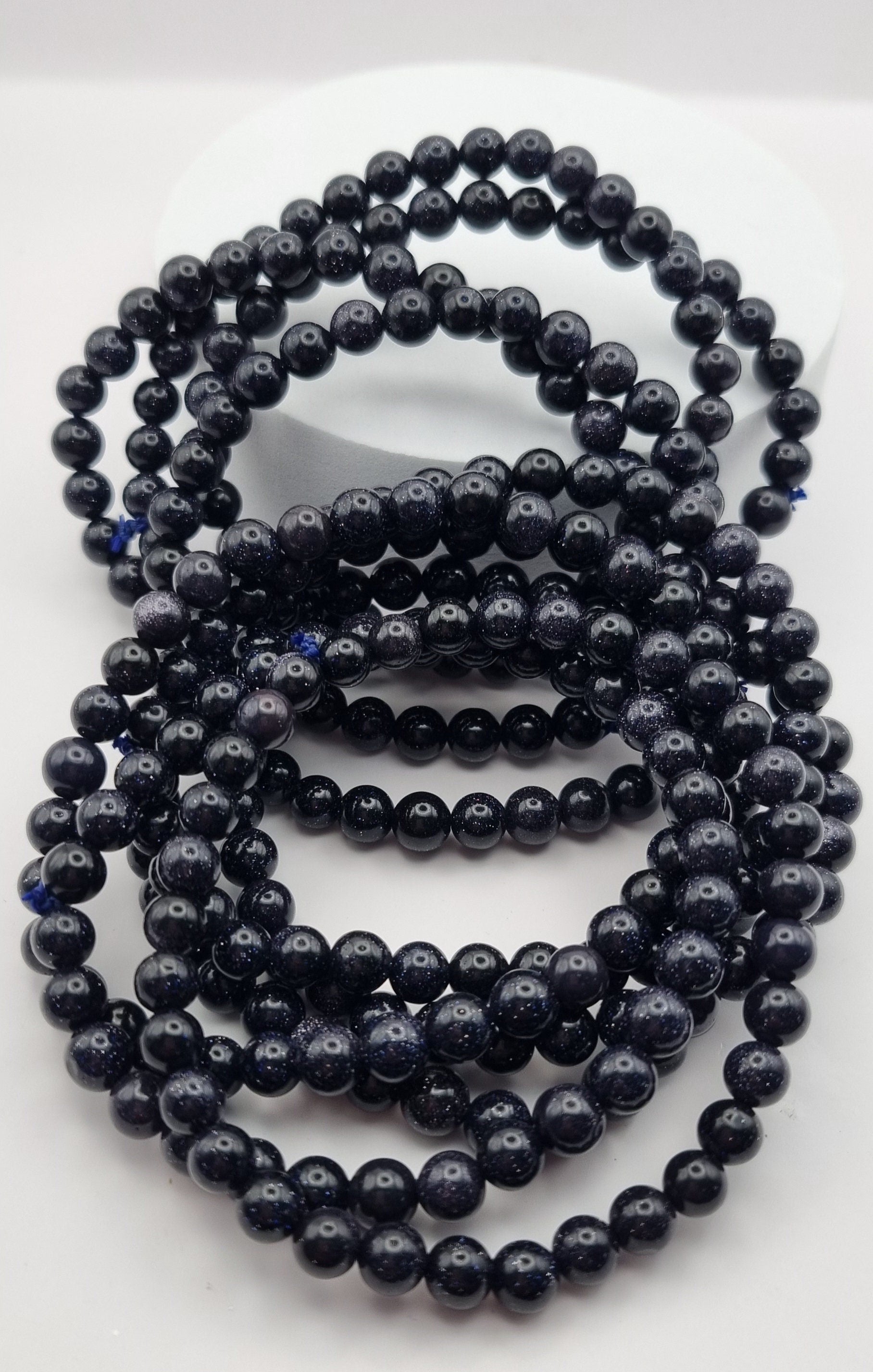 Shimmering Blue Goldstone Stretchy Crystal Bracelets. Size 7mm each.