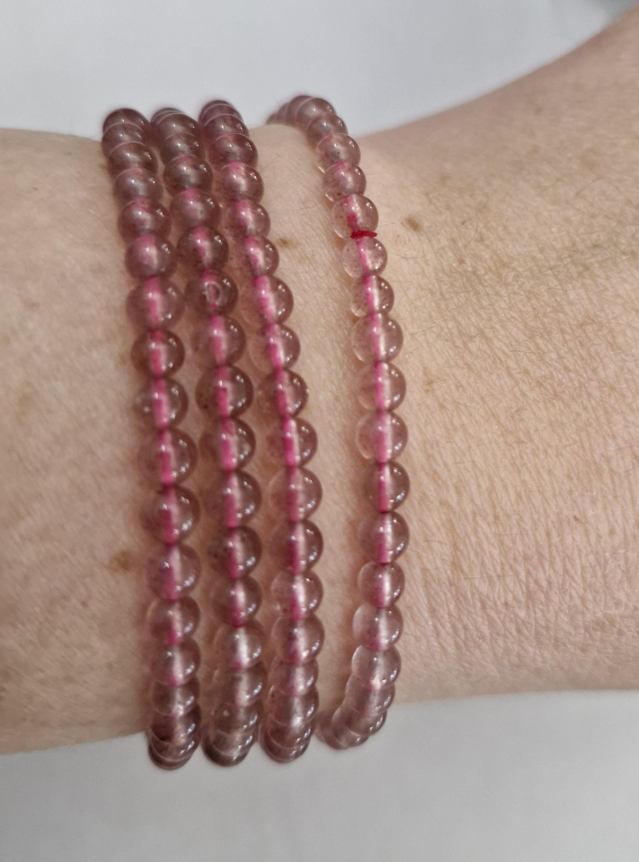 Handmade Stawberry Quartz bracelets with adjustable stretchy banding. Size 6mm