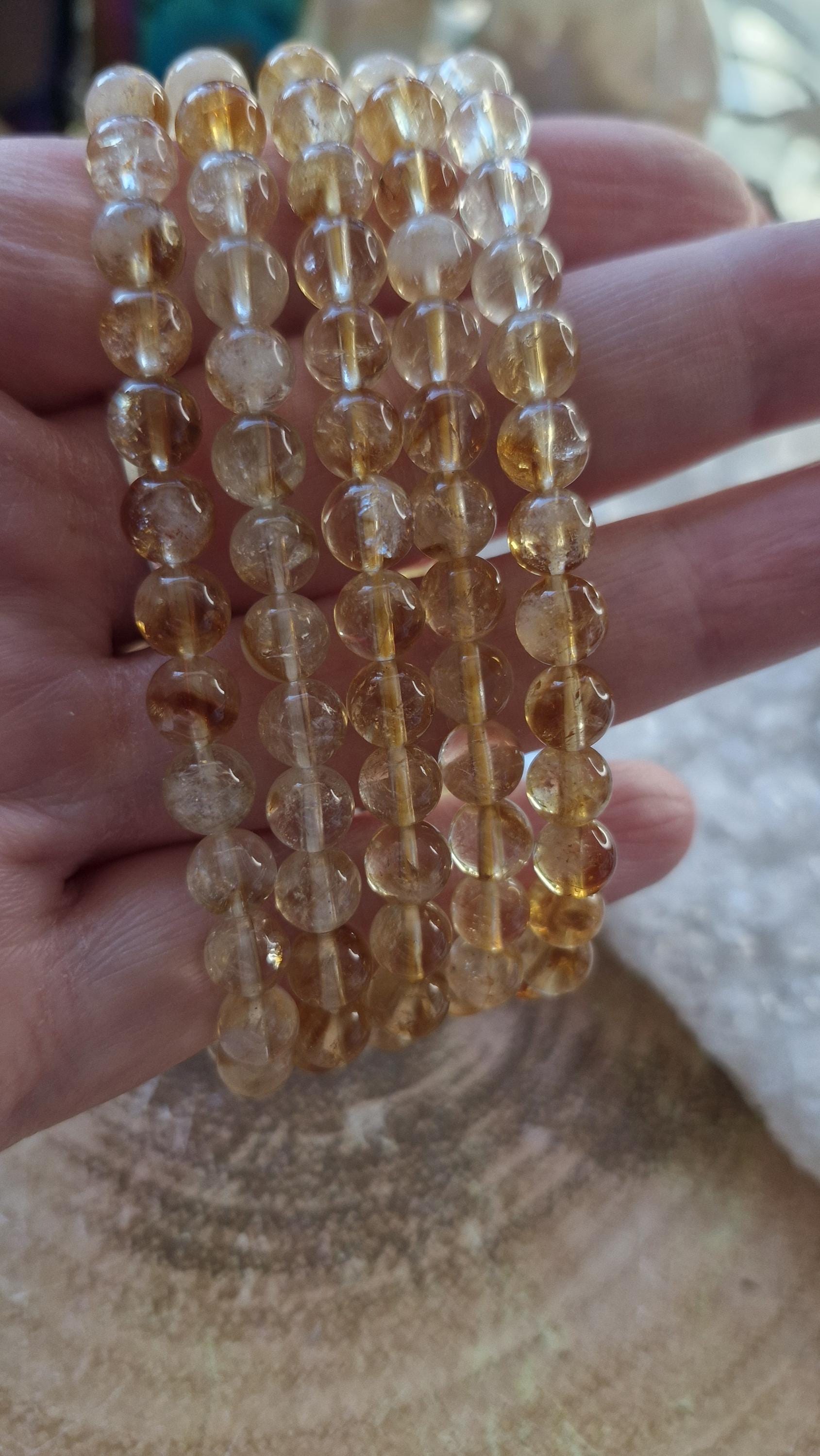 Handmade Citrine Beaded Crystal/ Gemstone Bracelets with Adjustable stretchy band.