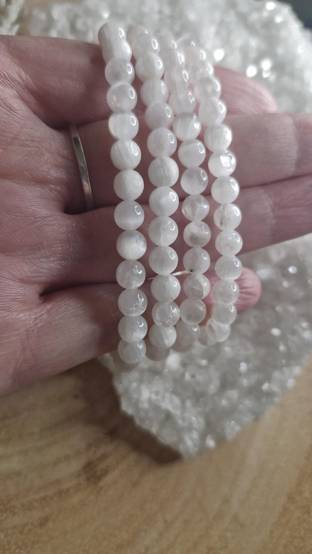 Natural Selenite hand crafted stretchy crystal bracelets. Each one 6mm in size.