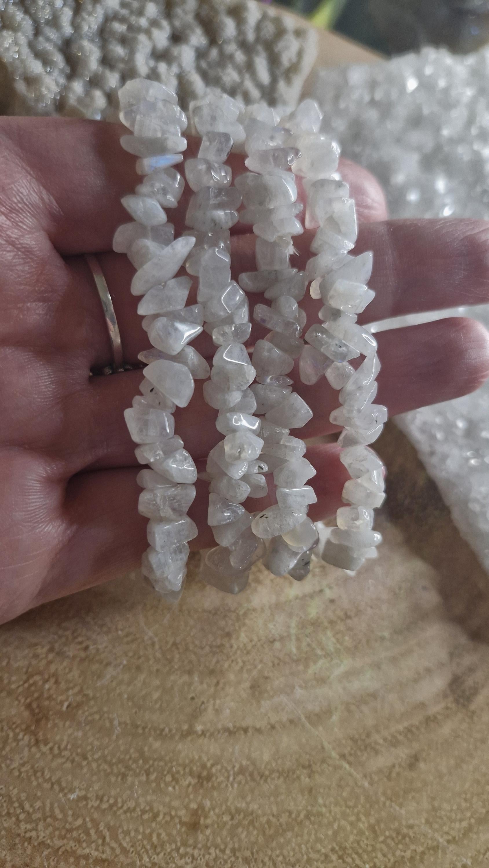 Natural chipped and beaded flashy white Moonstone crystal bracelets with stretchy band.