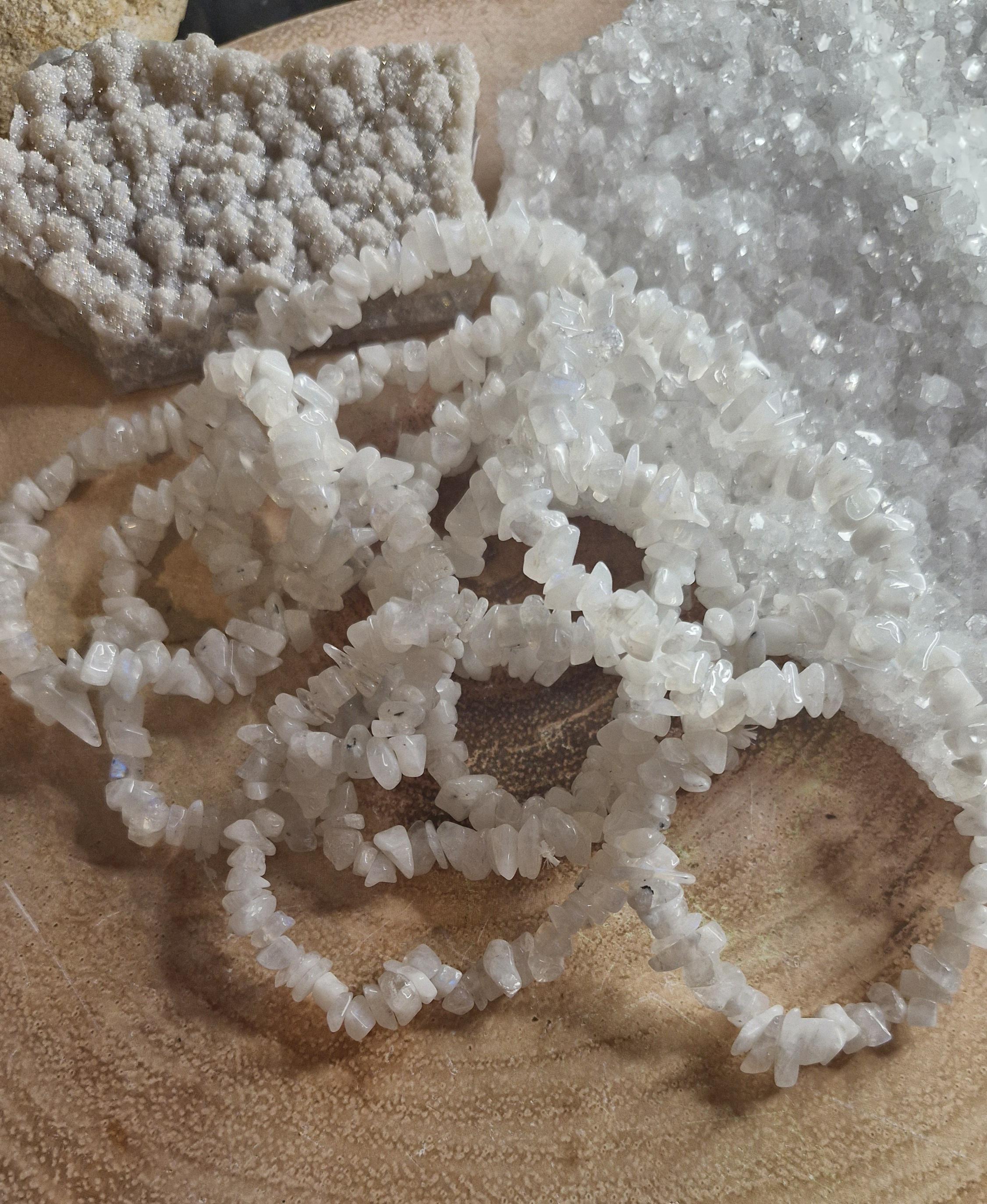 Natural chipped and beaded flashy white Moonstone crystal bracelets with stretchy band.