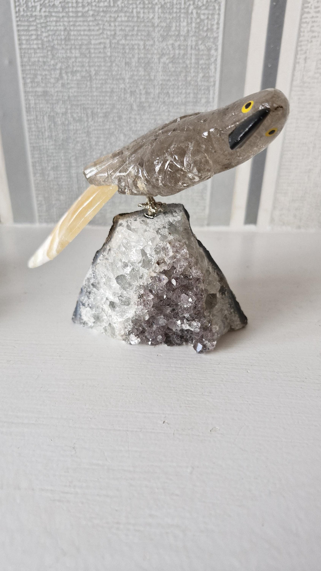 Hand carved gemstone/ crystal birds of Paradise. Bird detachable and has a Amethyst base.