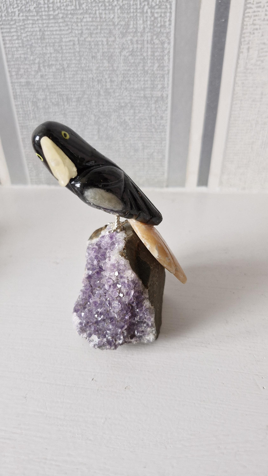 Hand carved gemstone/ crystal birds of Paradise. Bird detachable and has a Amethyst base.