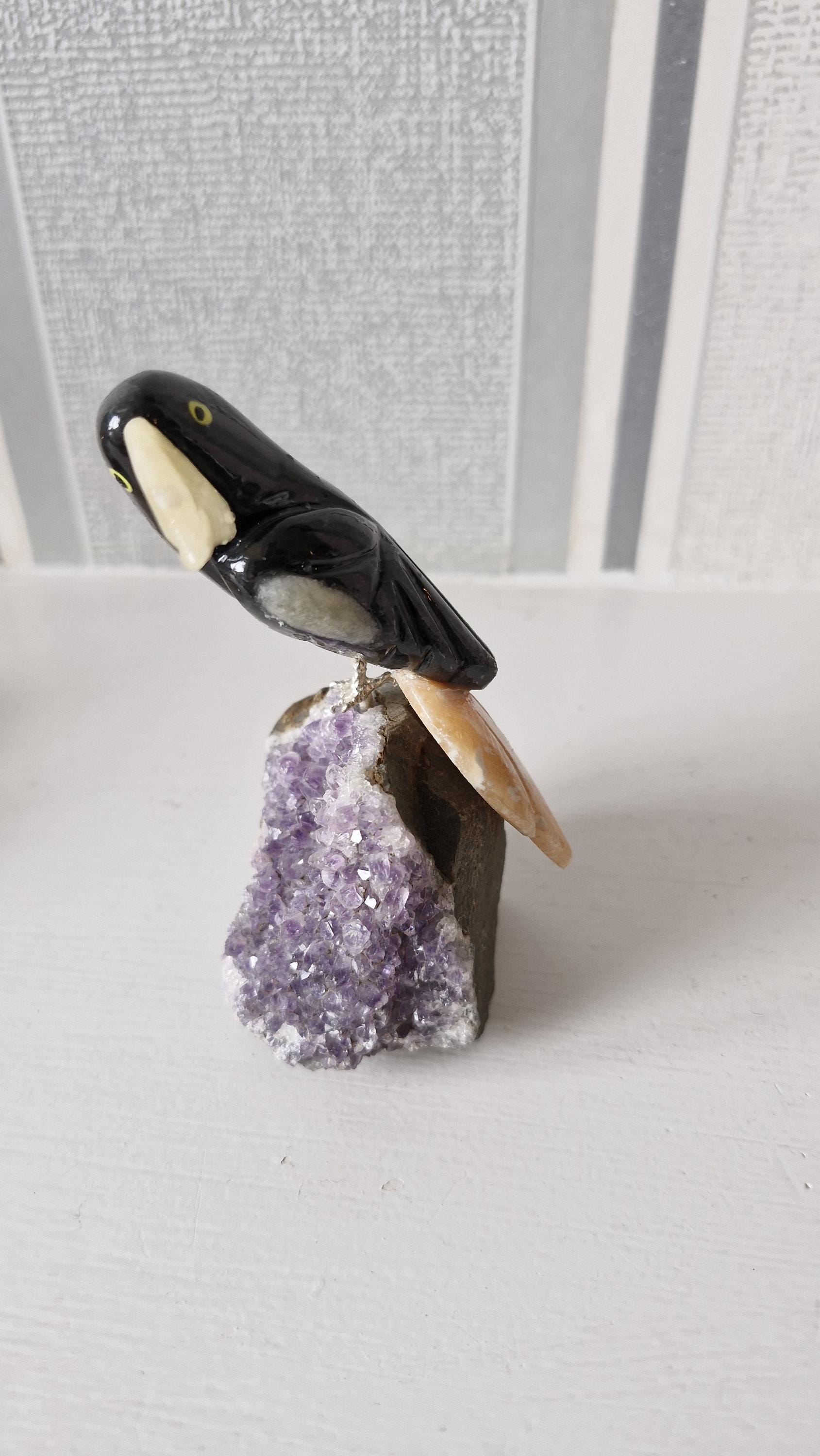 Hand carved gemstone/ crystal birds of Paradise. Bird detachable and has a Amethyst base.