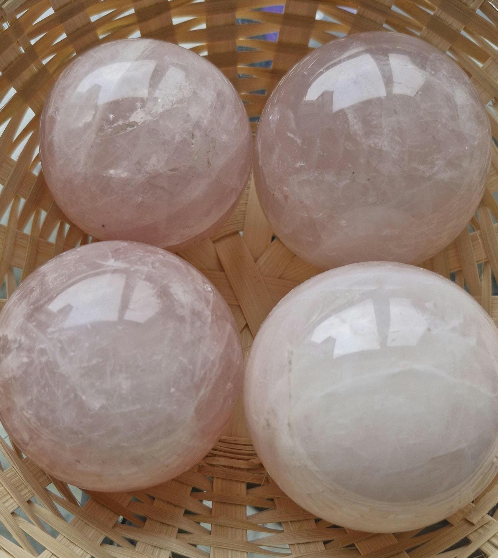 Natural pink crystal / gemstone Rose Quartz spheres from Brazil.