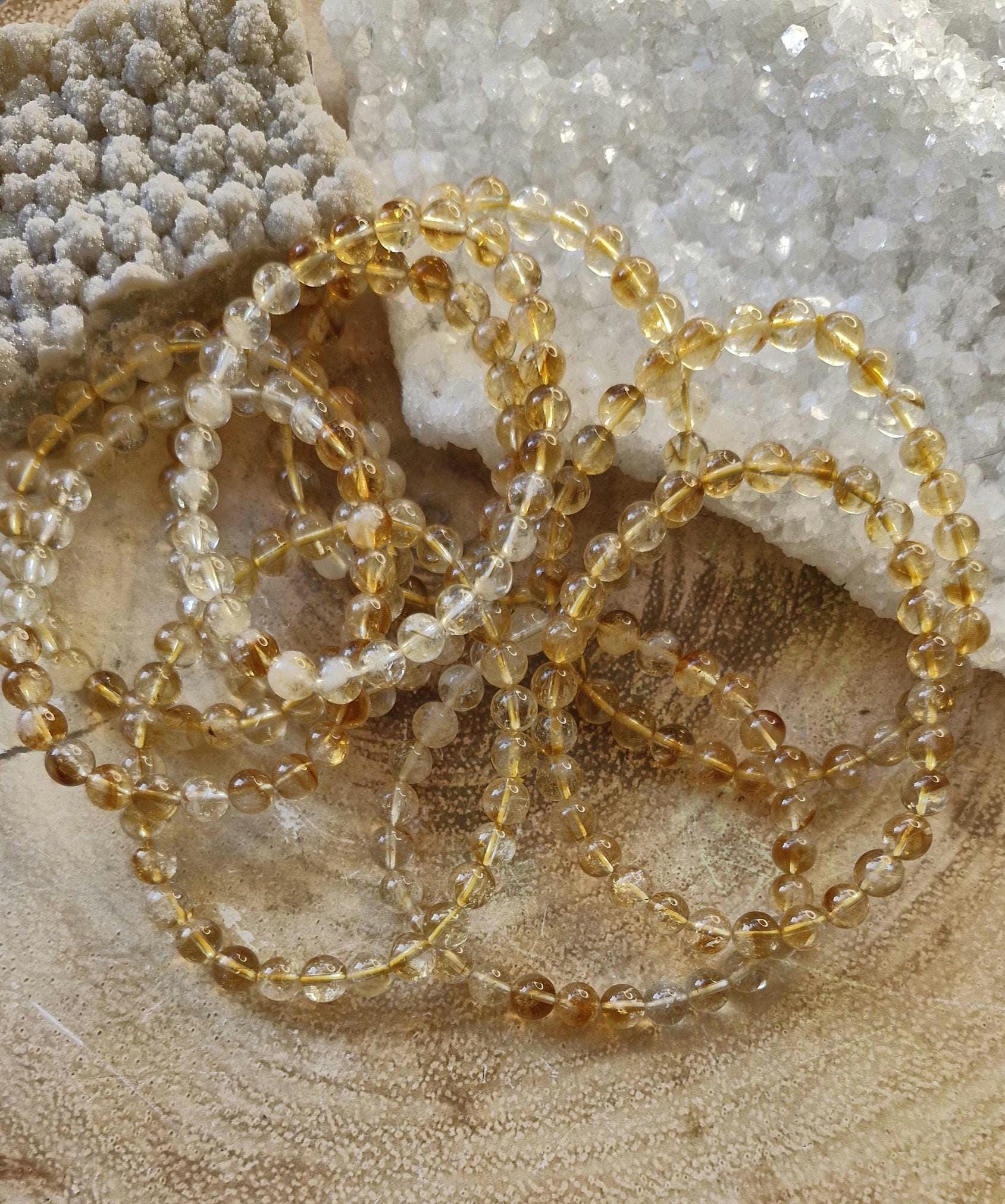 Handmade Citrine Beaded Crystal/ Gemstone Bracelets with Adjustable stretchy band.