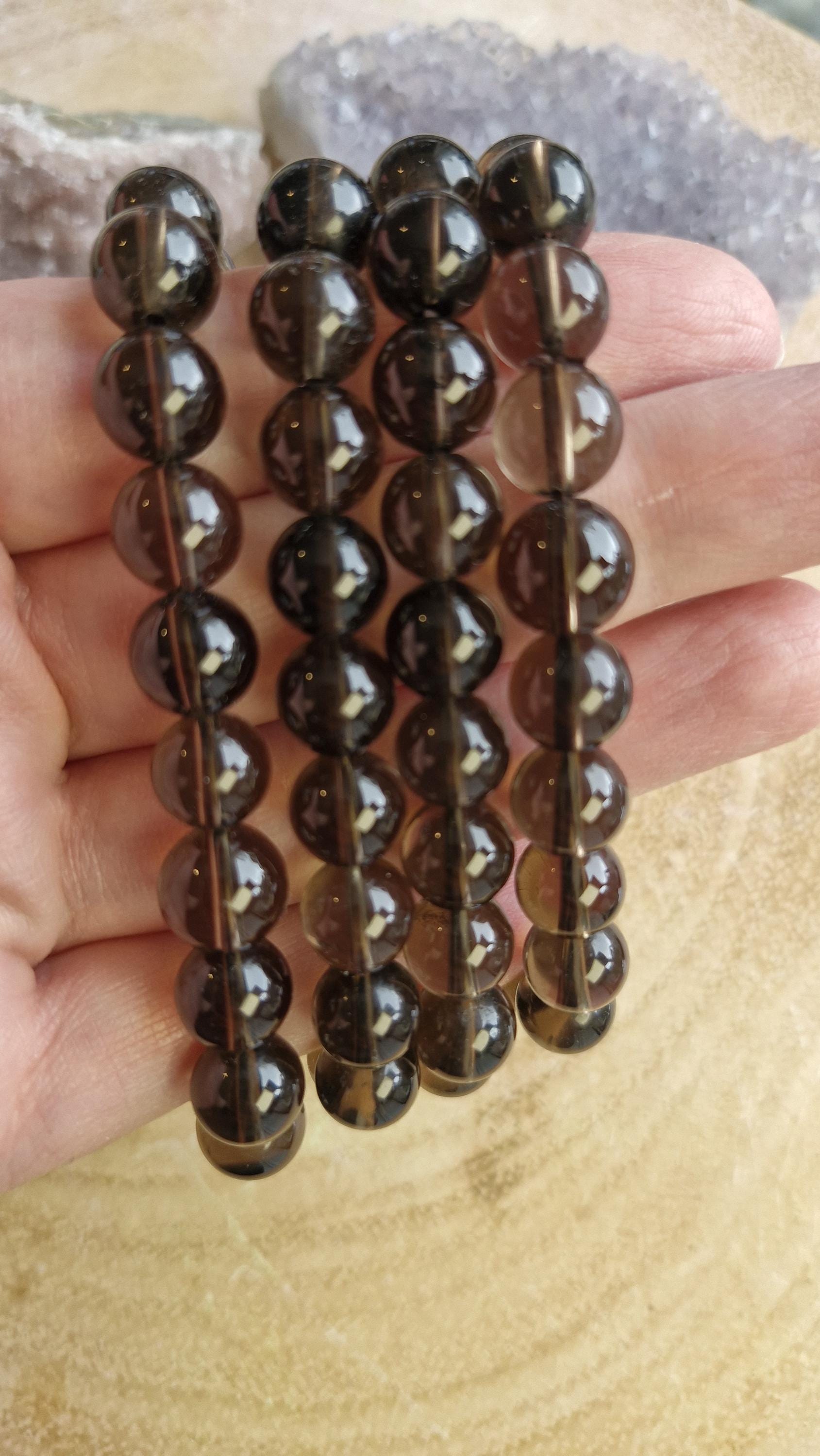 Natural high grade Smokey Brown Quartz Bracelets 8mm with a stretchy adjustable band.