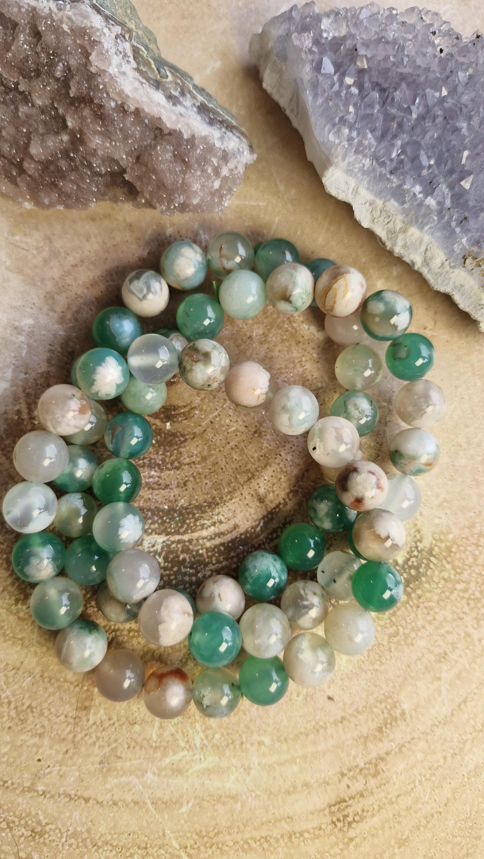 Rare Green flower agate crystal bracelets with adjustable stretchy banding. Bead size 10mm