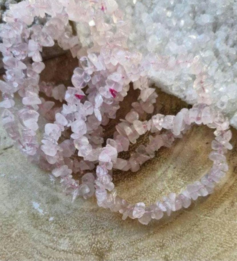 Variety of Natural Chipped Crystal Bracelets. Each one has a stretchy adjustable band.