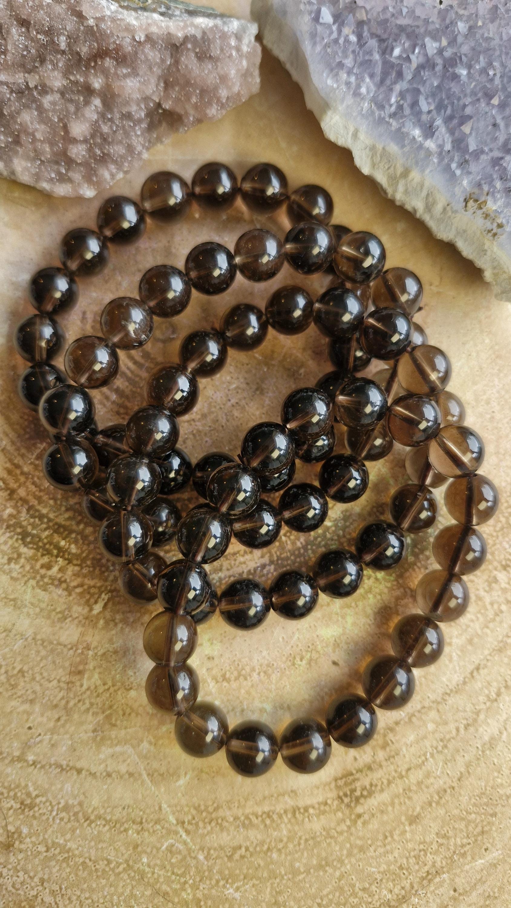 Natural high grade Smokey Brown Quartz Bracelets 8mm with a stretchy adjustable band.