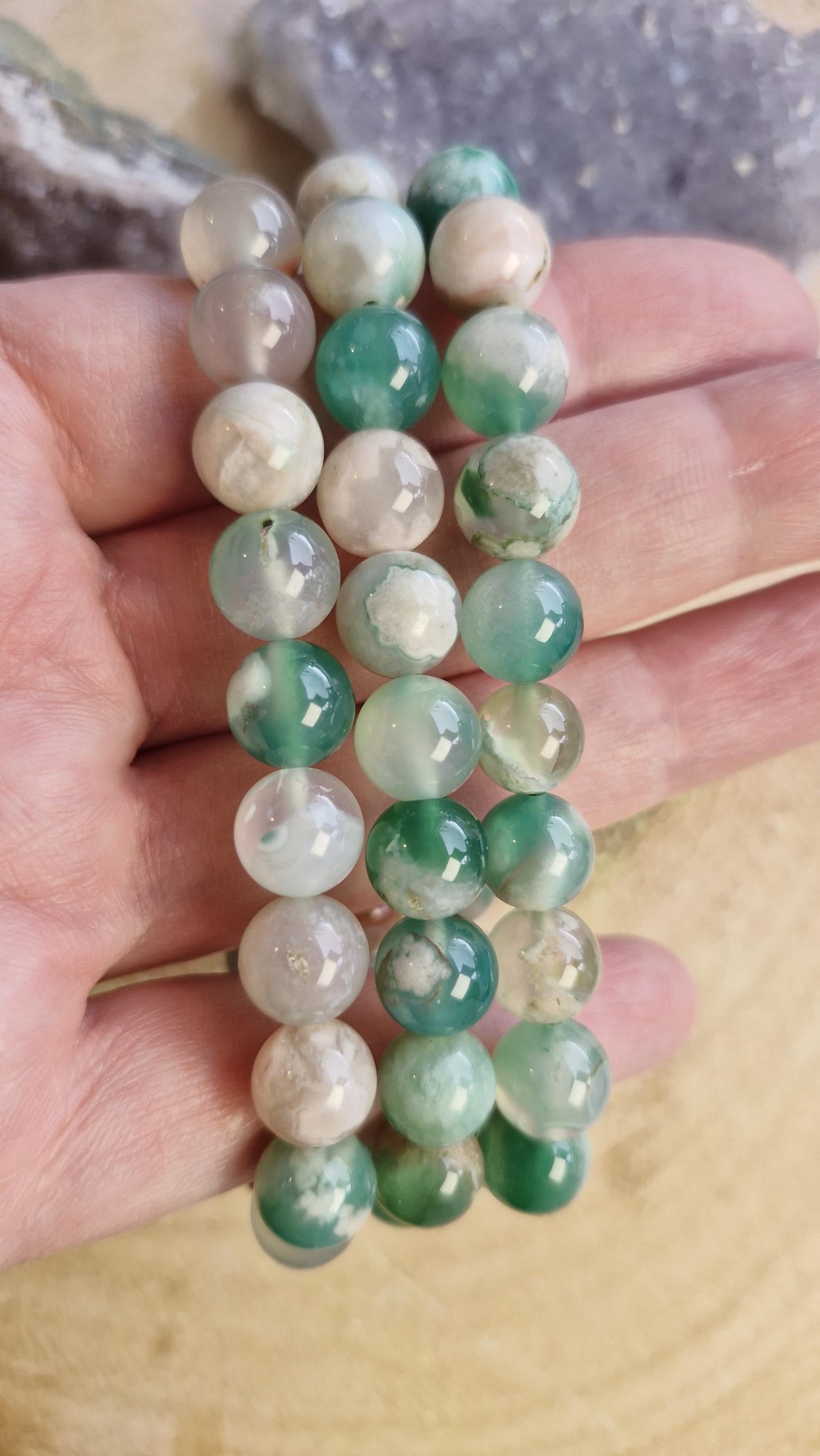 Rare Green flower agate crystal bracelets with adjustable stretchy banding. Bead size 10mm