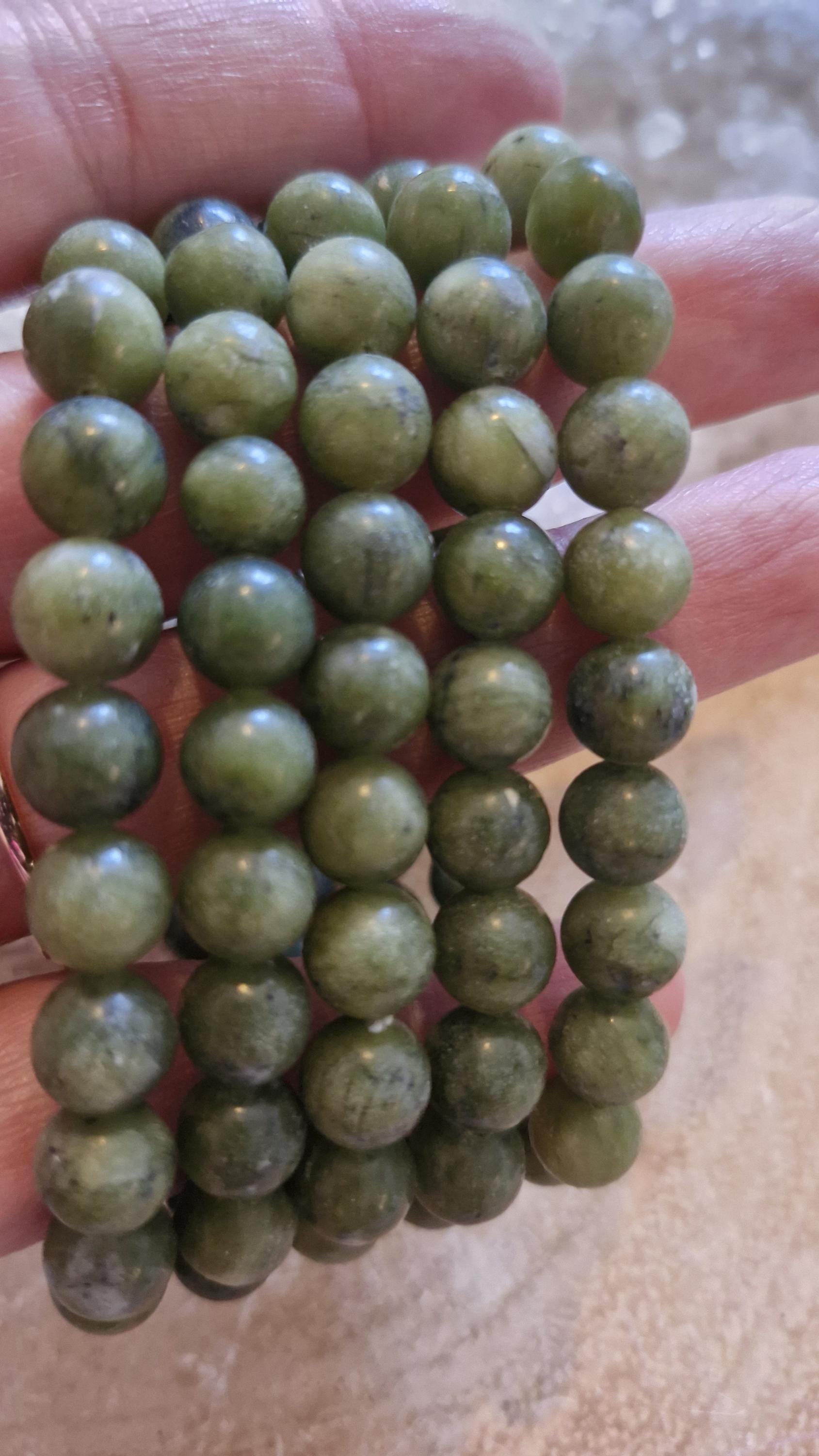 Genuine high grade Nephrite Jade Gemstone Bracelets 10mm with adjustable stretchy banding.