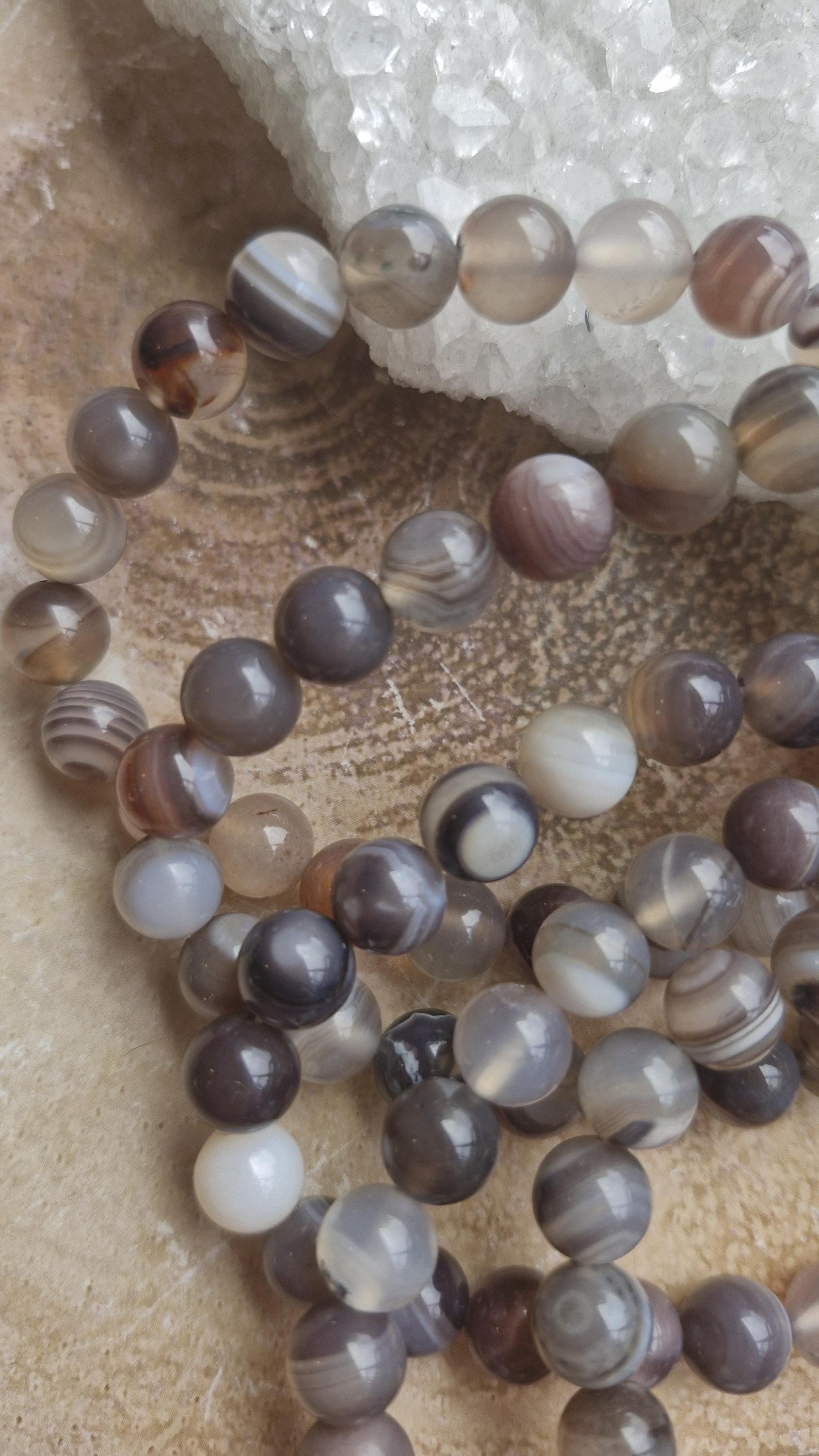 Botswana Agate Crystal Bracelets with adjustable stretchy band.
