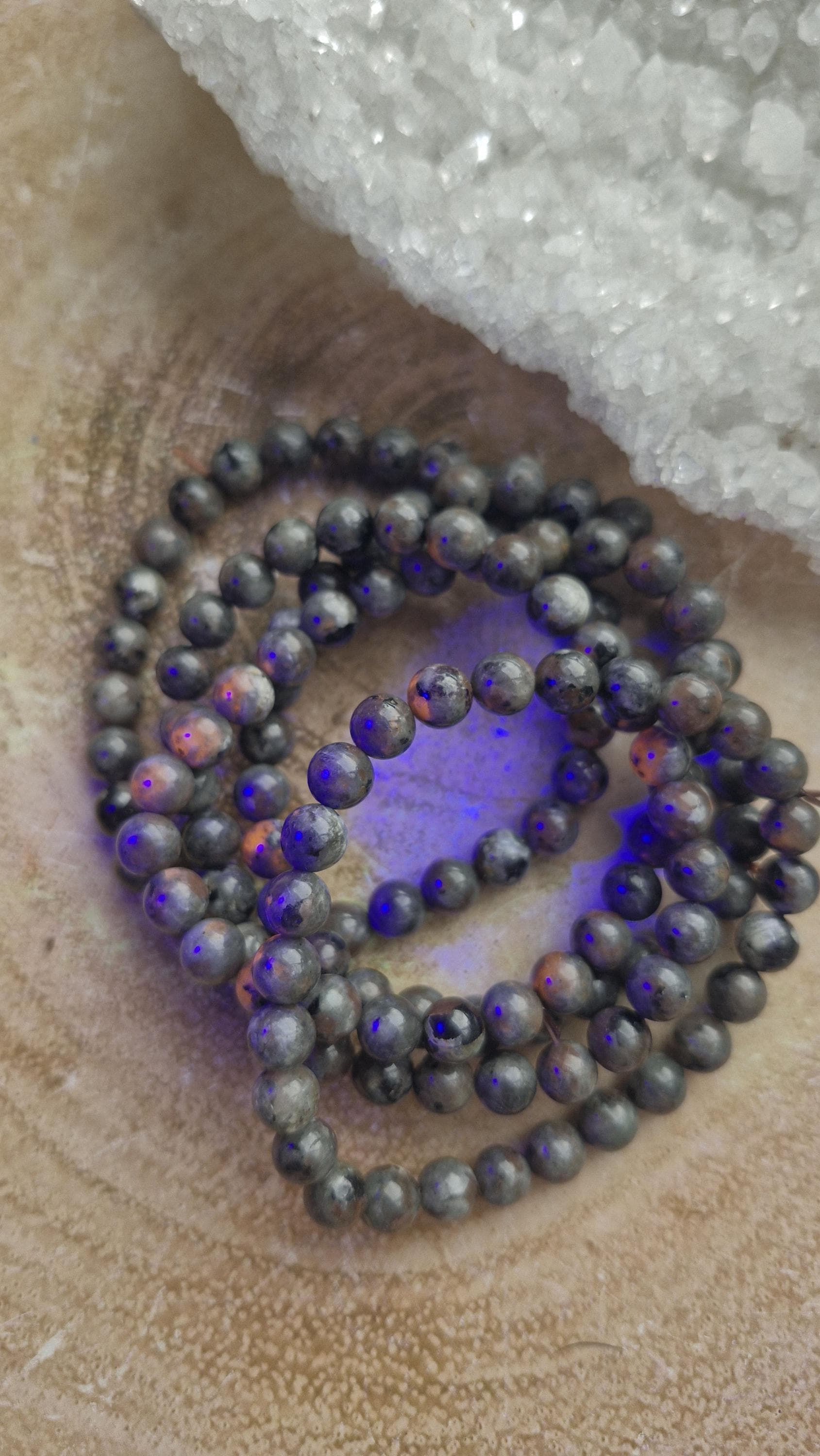 Yooperlite UV florescent beaded crystal bracelets with stretchy adjustable band.
