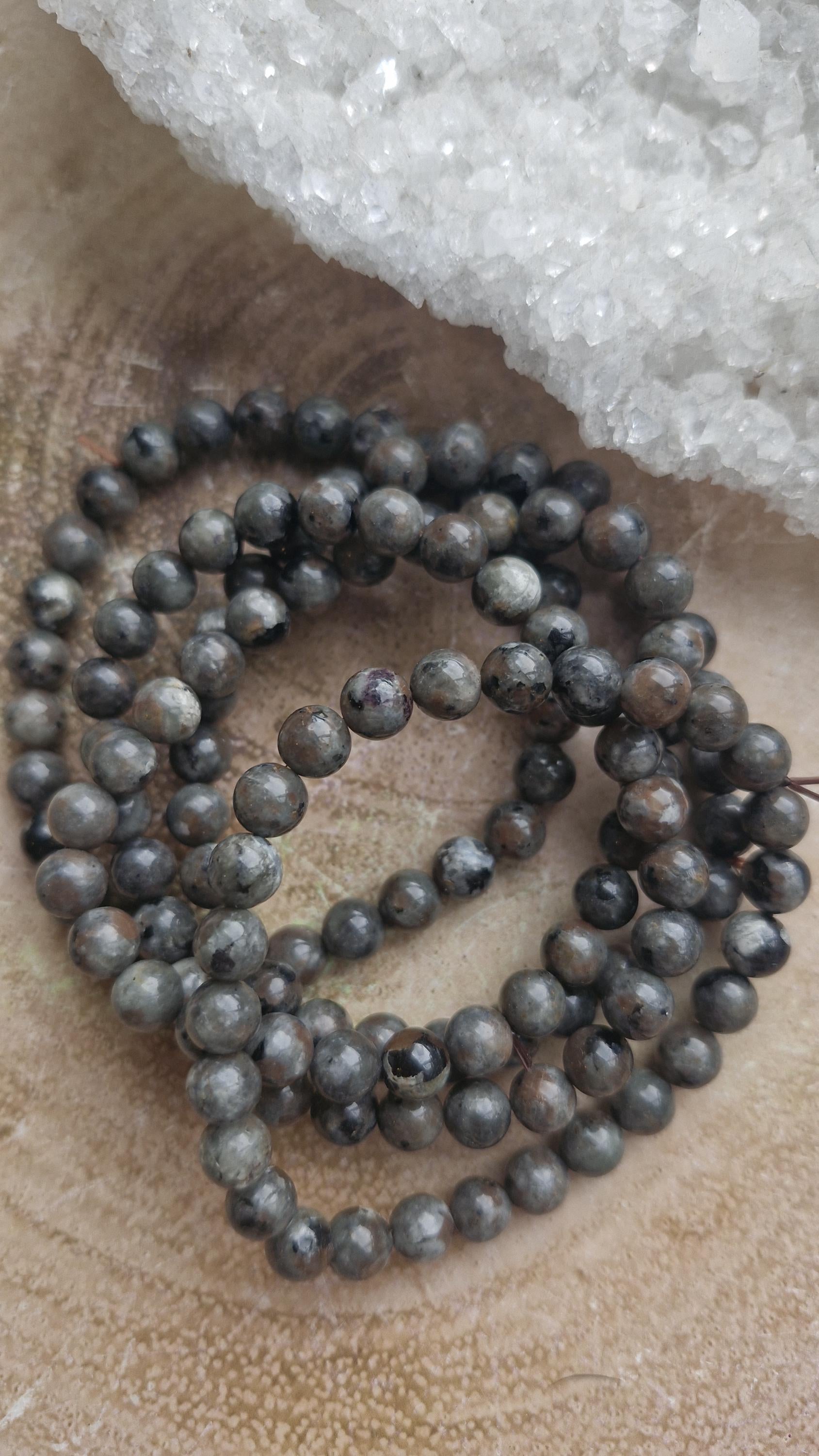 Yooperlite UV florescent beaded crystal bracelets with stretchy adjustable band.