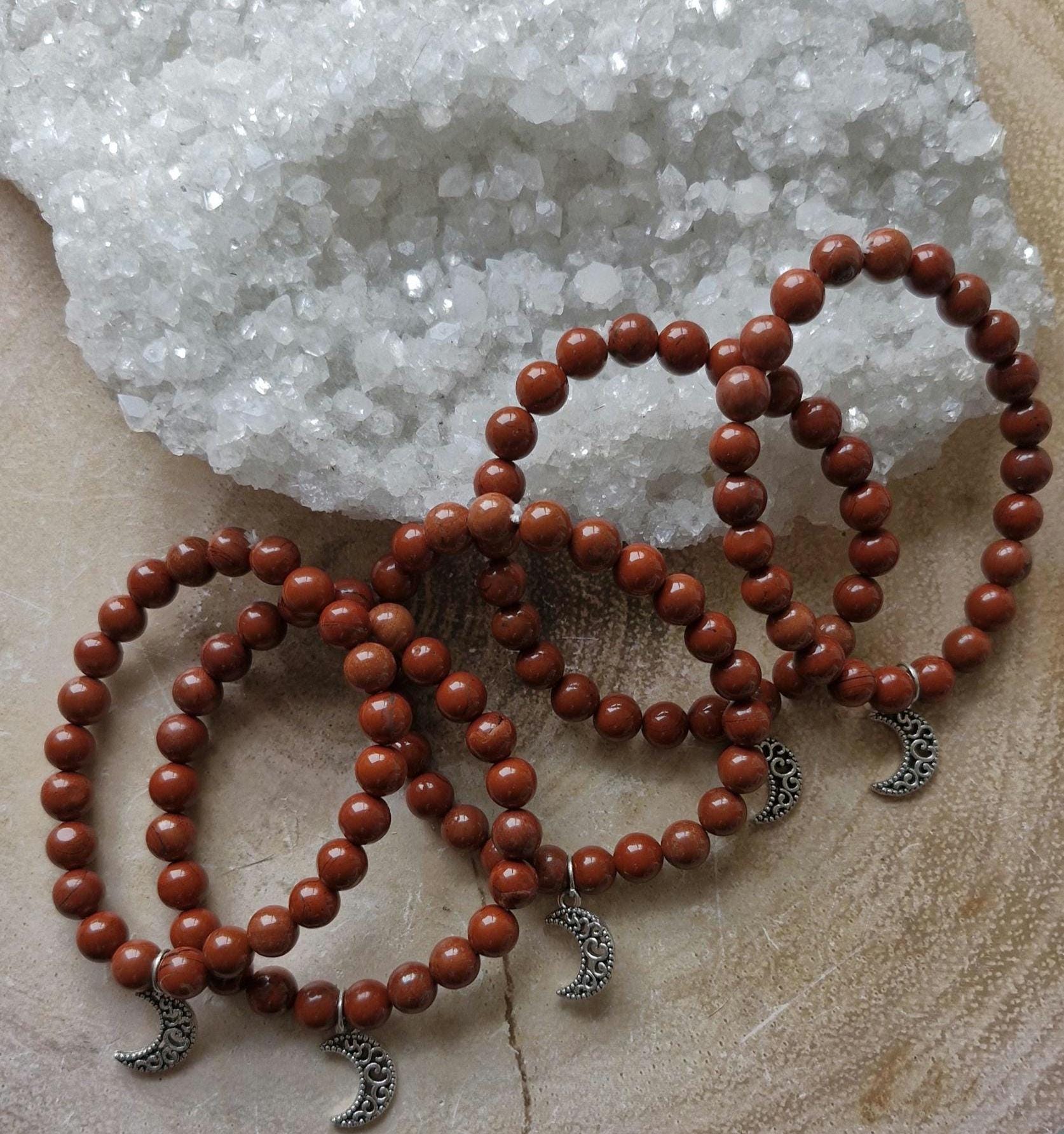 Natural Angelite and Red Jasper crystal bracelets with a silver moon charm.