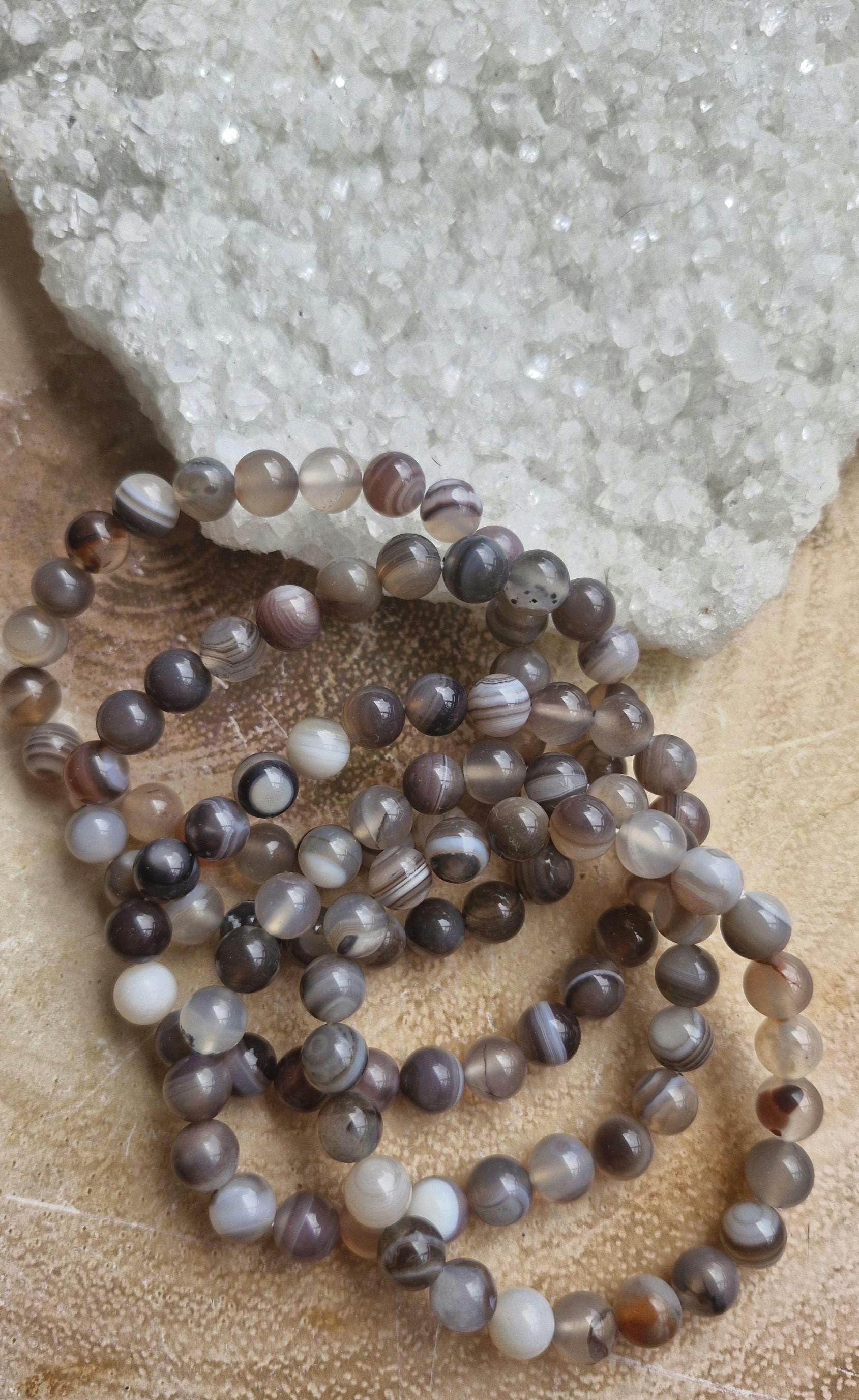 Botswana Agate Crystal Bracelets with adjustable stretchy band.